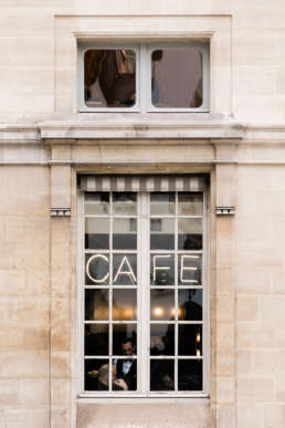 Photo of a cafe window in Paris, France